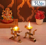 Brass Swastik Diya pair